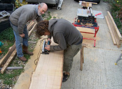 Steve and Chris sawing up oak planks